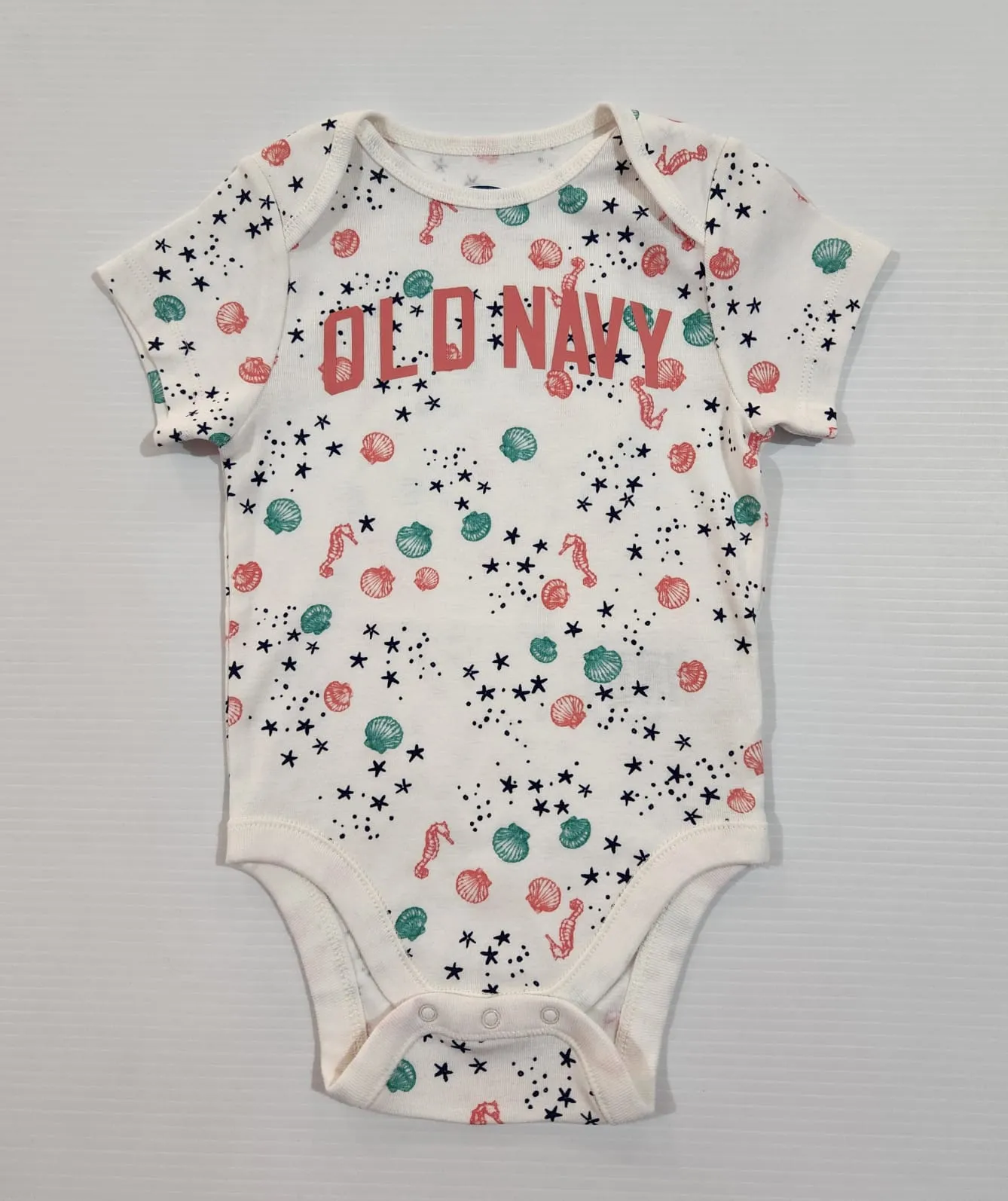Seashell Logo Bodysuit